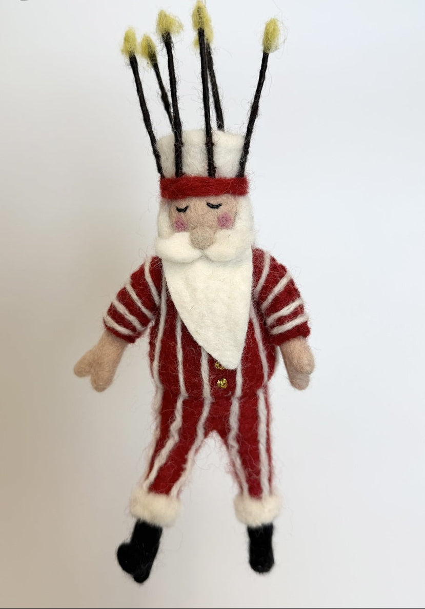 Whimsical Dancing Santa Christmas Ornament, handmade in wool, wearing a red and white striped suit and a hat with tall, thin spikes topped with yellow tufts.