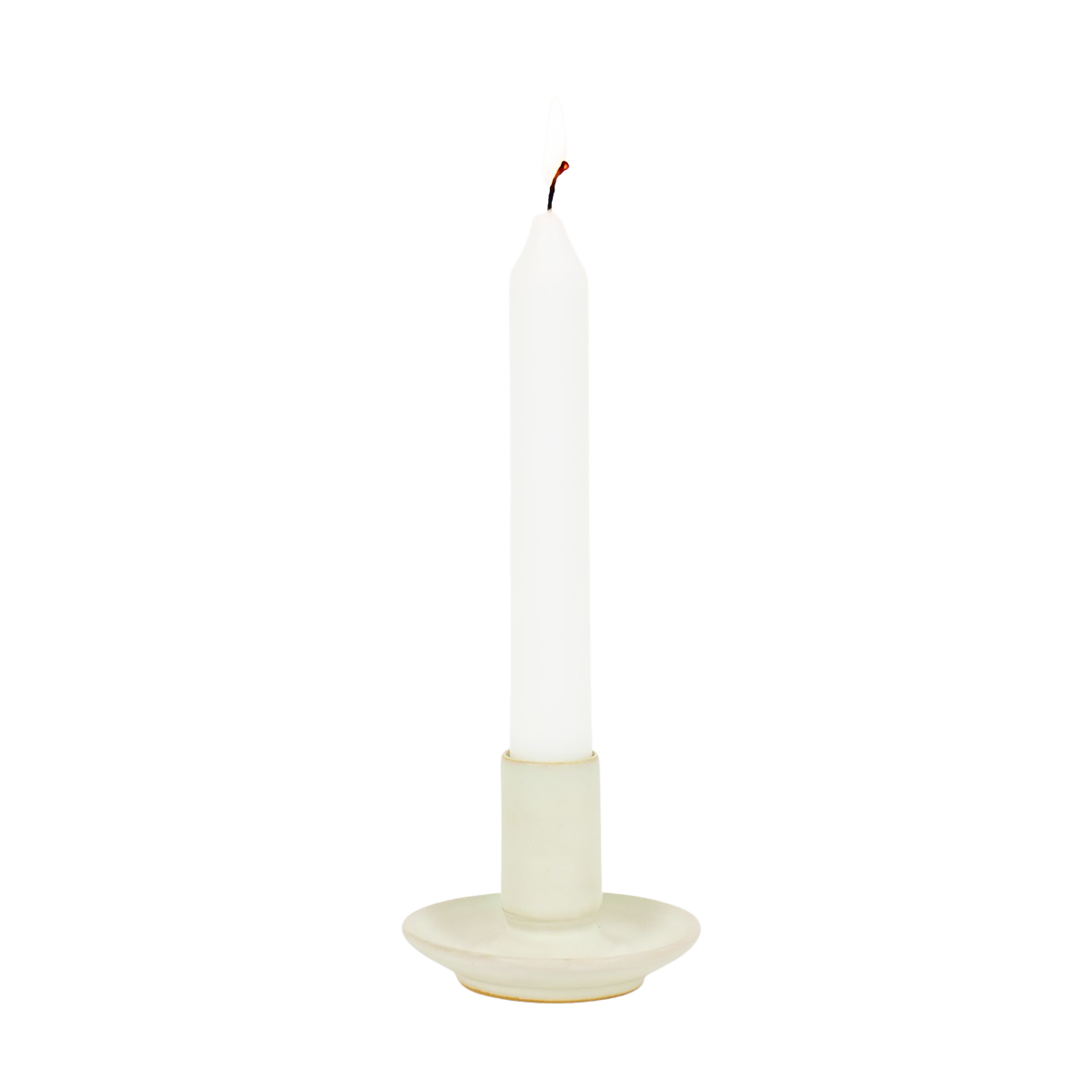 A white taper candle with a small flame rests in the Hera Handmade in Beige Candle Holder by A World of Craft, showcased against a plain white background.