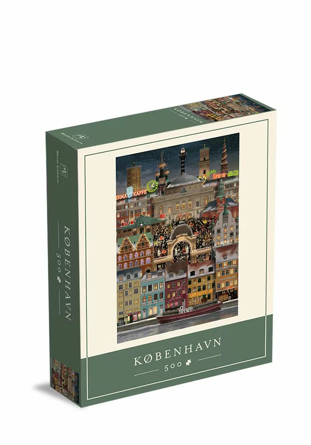 Christmas in Copenhagen Puzzle, 500 Pieces by Martin Schwartz, featuring an illustration of Copenhagen storefronts and buildings decorated for the holidays with the word København printed on the packaging.