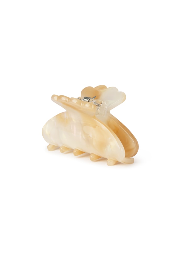 Sui Ava Helle Flopsy Mini Hair Claw Clip in Beige, a small marbled hair clip with scalloped edges.