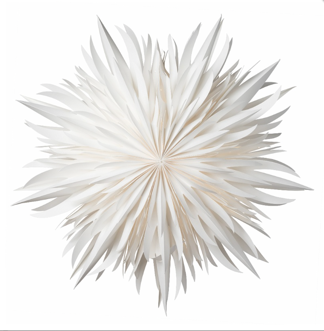 The Watt & Veke Star Eldig is a 52 cm white paper star with a folkloristic, spiky starburst design, crafted from layered material and displayed against a plain background.