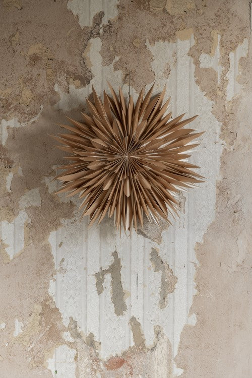 The Star Maja in Paper, Gold 60cm from Watt & Veke adds a decorative burst of gold to any space—ideal for fans of unique paper stars and textured designs.