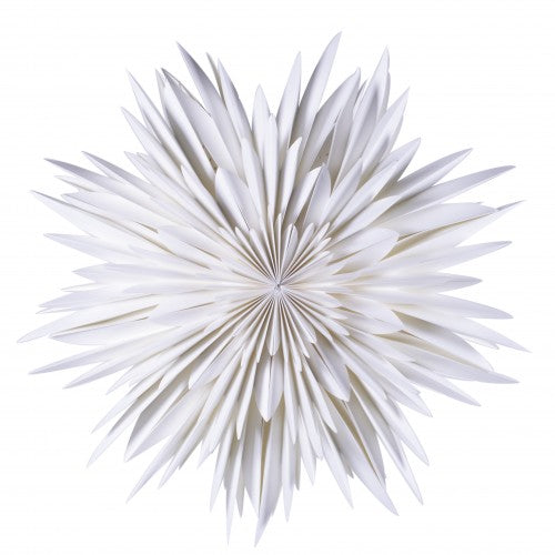 The Star Maja in Paper, White 60cm by Watt & Veke features a symmetrical starburst with pointed, layered petals radiating from the center, beautifully presented against a white background and packaged in a box.