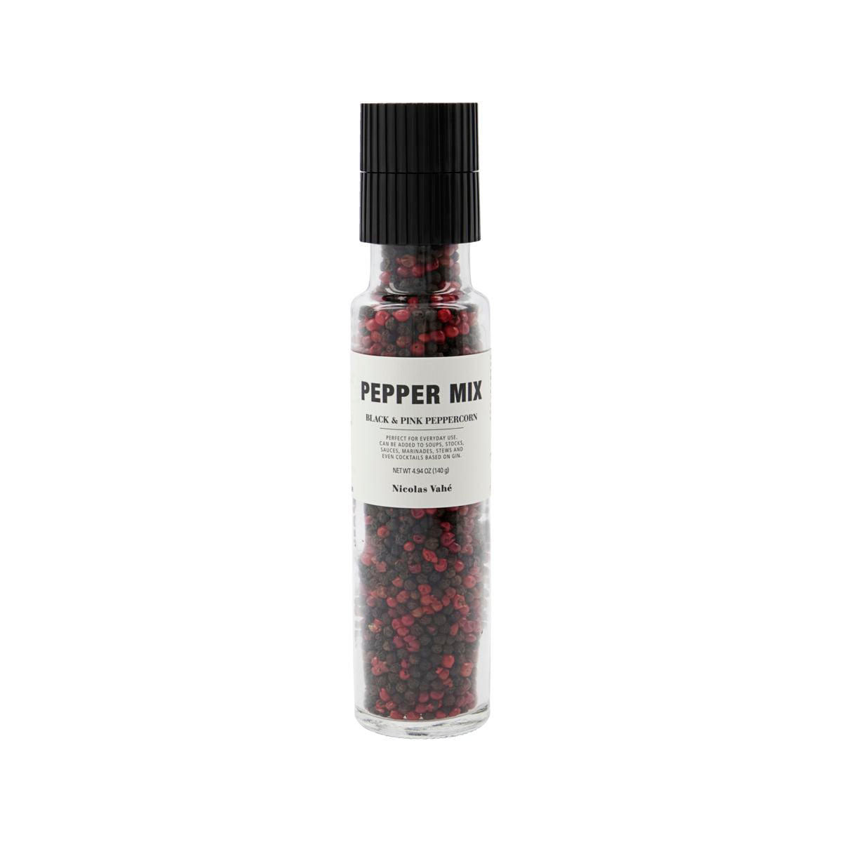 Nicolas Vahes Pepper Mix Grinder w. Black & Pink peppercorns comes in a clear glass bottle with a sturdy black ceramic cap and is filled with vibrant black and pink peppercorns.