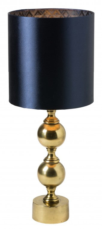 The Ronald Lampshade in Blue 19cm by Watt & Veke features a dark blue cylindrical shade and a gold base with two stacked spheres and a round bottom.
